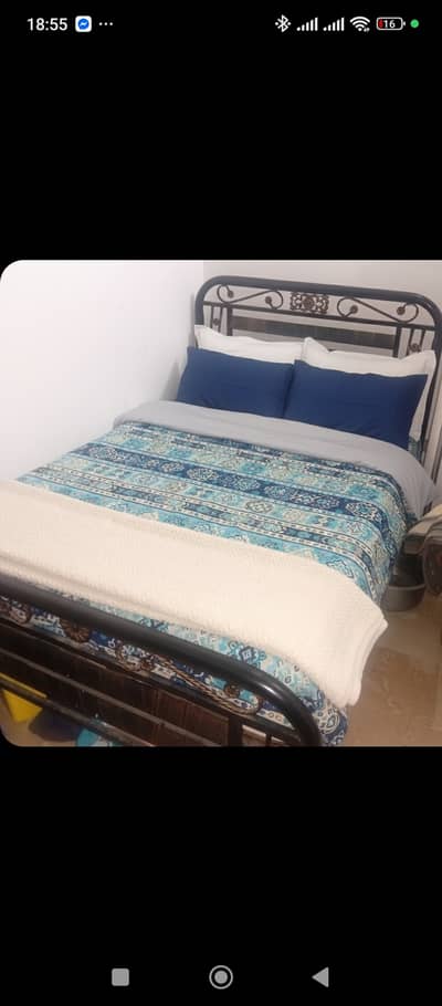 Iron rod bed with mattress