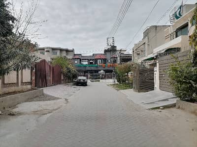 Prime Location 1 Kanal Commercial Plot Is Available On 80 Feet Main Road - Ideal For School Or Bank