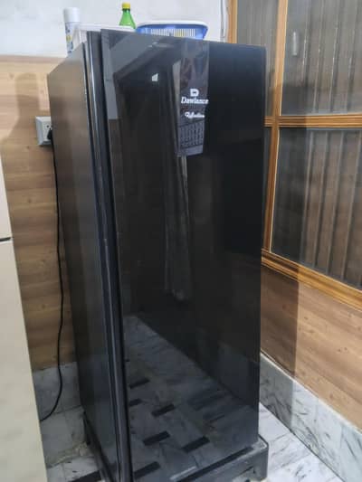 Dawlance vertical freezer working chill