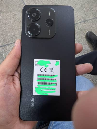 redmi note 14.8/256. black colour 10 month warranty remaining