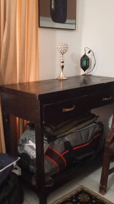 Side table in good condition solid wood