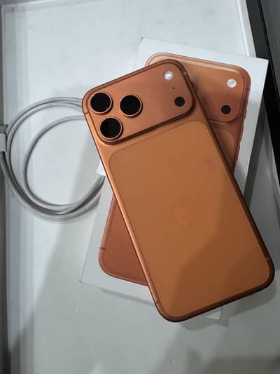 Iphone 17 pro max cosmic orange almost like new 10/10 with box