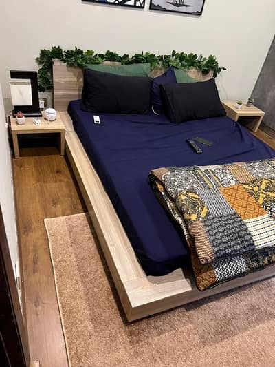 Queen Size bed with table and sofa