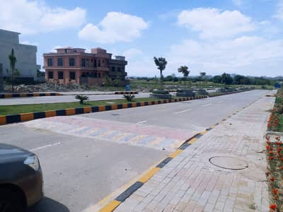 FAISAL TOWN BLOCK C 25*50 PLOT FOR SALE ON GOOD LOCATION FIRST COME FIRST AVAIL THIS BIG OPERTUINTY