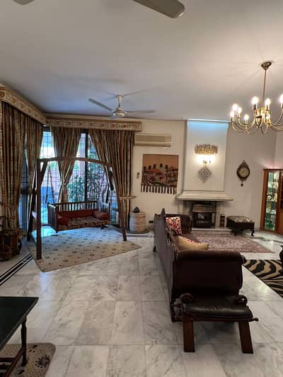 2 KANAL ELEGANT AND FULLY MAINTAINED SUPER HOT LOCATED BUNGALOW IS AVAILABLE IN THE BEST BLOCK OF DHA LAHORE.
