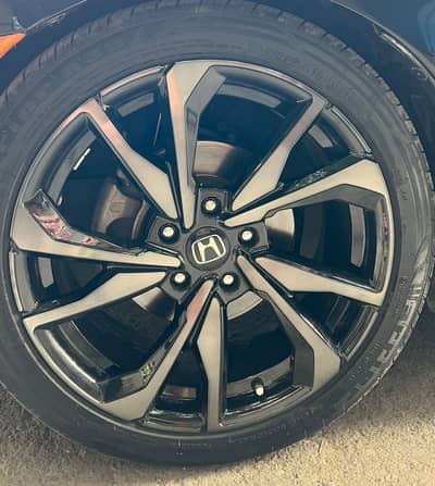 Si black rims with warrior tyre