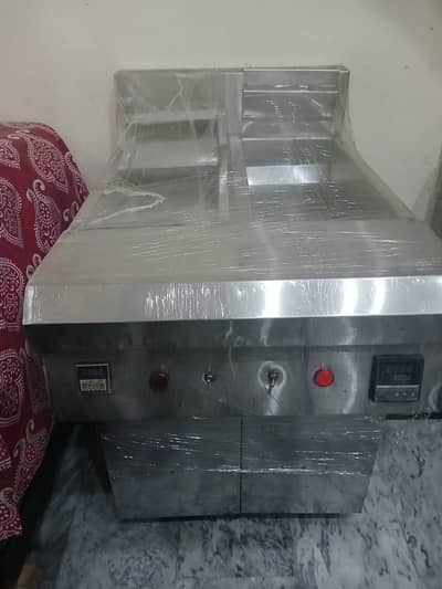 restaurant sitting fryer &freezer.