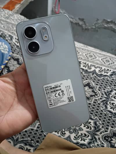 Infinix Smart 9 (4/128) With Original Charger Only.