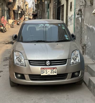 Suzuki Swift DLX 1.3 ABS 2016. Almost Genuine.