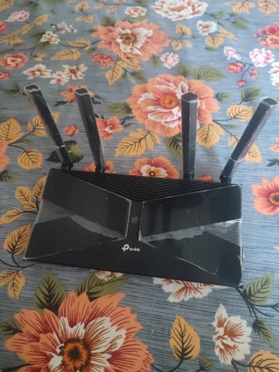 Tplink AX50 along with adapter only 1 month used