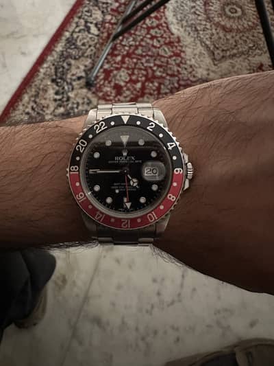Rolex GMT Master-II Coke Bezel ( Early 2000s )