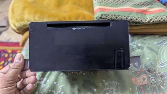 Toyota OEM car stereo receiver and infotainment system.