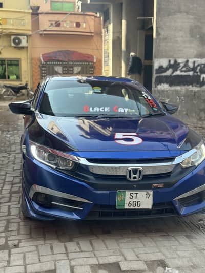 Honda civic vti orial prismatic full option ug total jeniun
