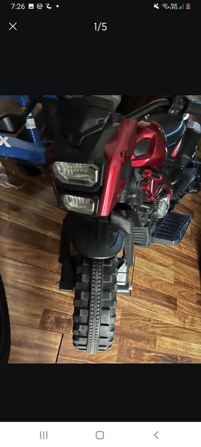 red colour bike for kids and  with charger