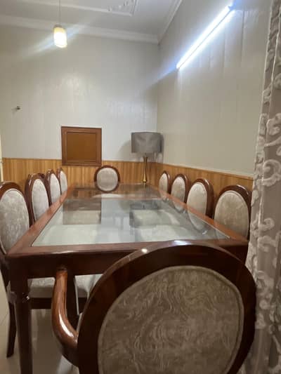 Dining table with chairs.