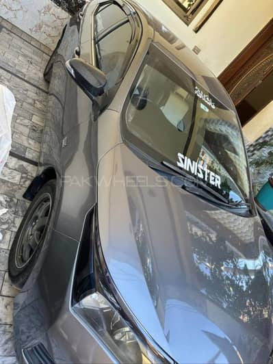 کرولا جی ایل ائی 2014