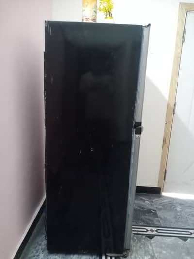 Full size fridge in working condition for sale