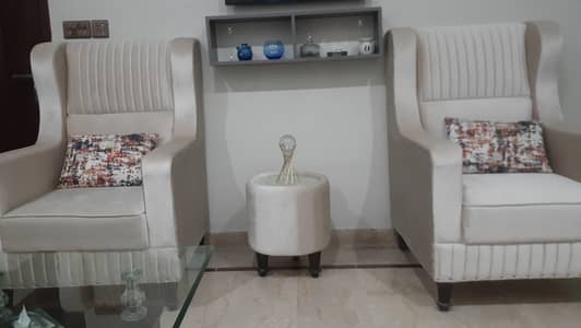 2 seater sofa and small  round table