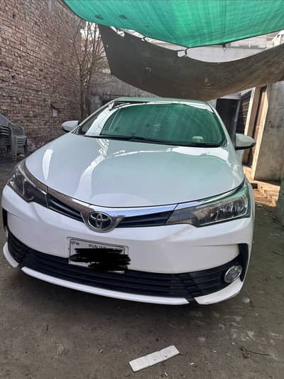 Toyota GLI 19/22 model super white automatic