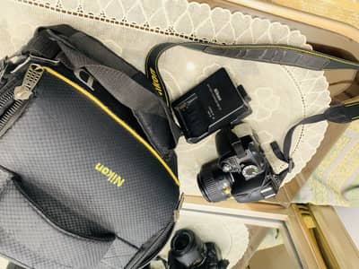 Nikon D3100 camera with 18-55 mm lens urjent sell urjent need money