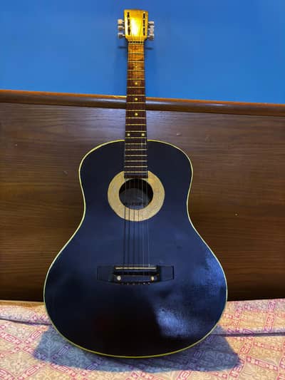 Acoustic guitar with bag and accessories