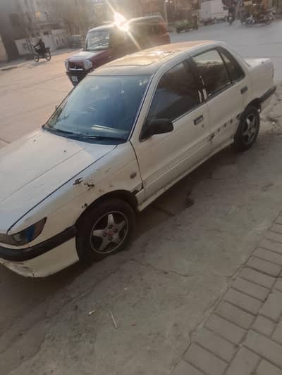 Mitsubishi lancer 1990 model Islamabad number (03418937127)