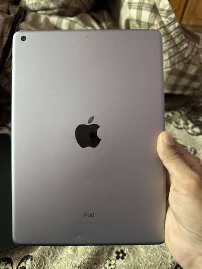 Ipad 5th generation with Baesus book cover