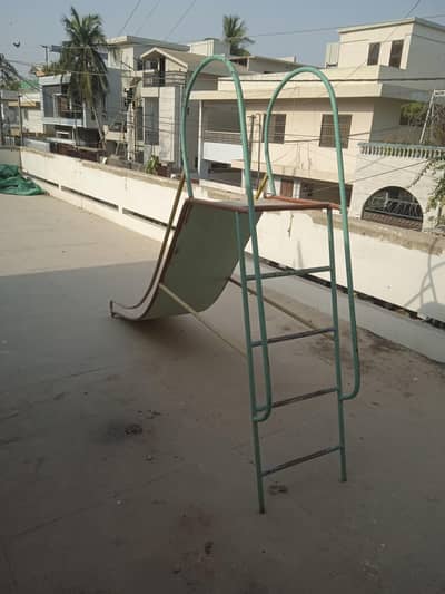slide, merry-go-round and cupboard for sale