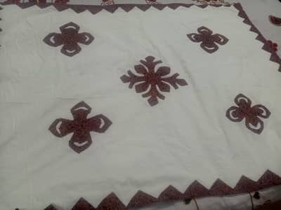 applic work on new born baby's sheets