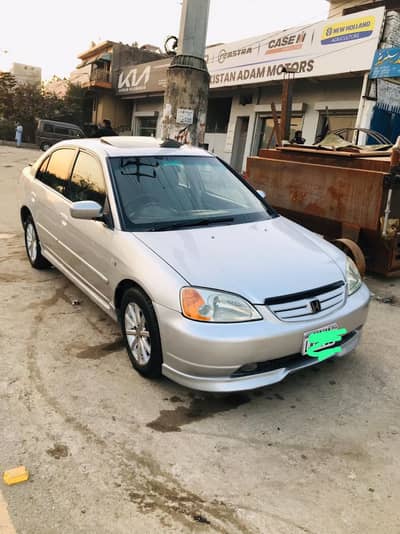 Honda civic vti oriel 2003 model for urgent  need money.