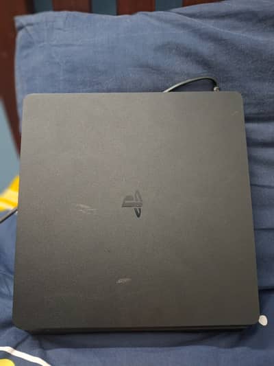 PS4 Slim 500GB – Excellent Condition – With God of War – Complete Setu