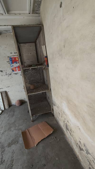 one iron cage one wooden cage