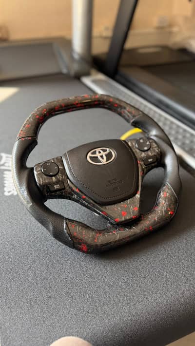 Carbon fibre steering with multimedia