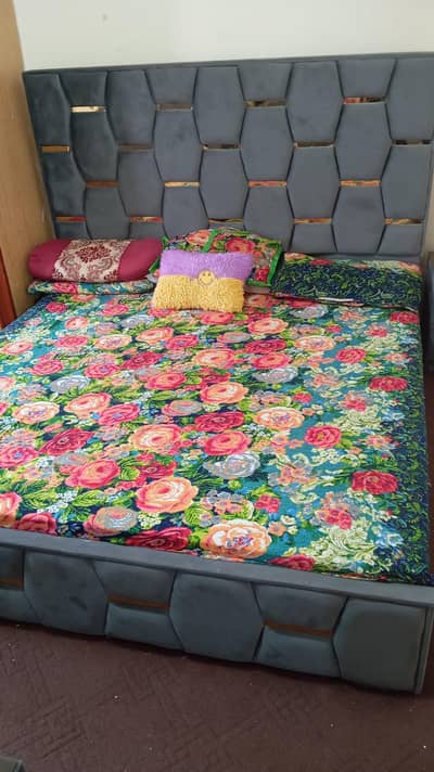 Bed with side tables and dressing table