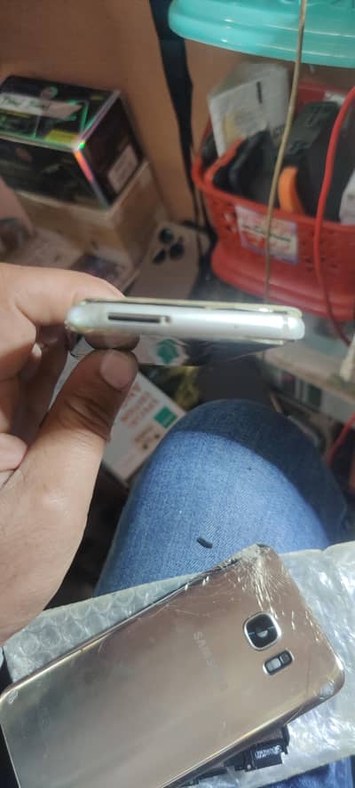 S7 edge mother board pta all ok contact 03075446311