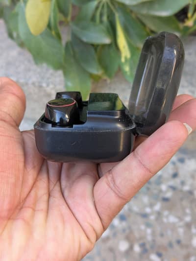 M30 TWS True WirelessEarbuds in a charging case.