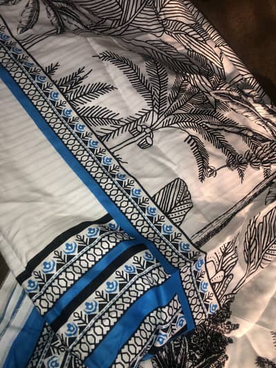 J. New article with embroidered patch