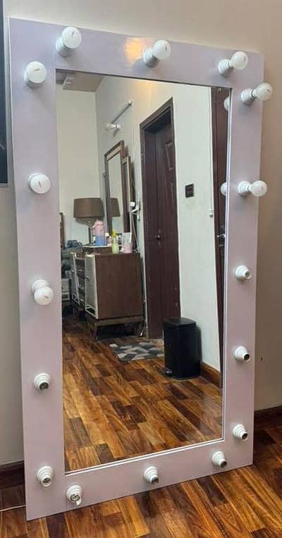 long mirror with lights