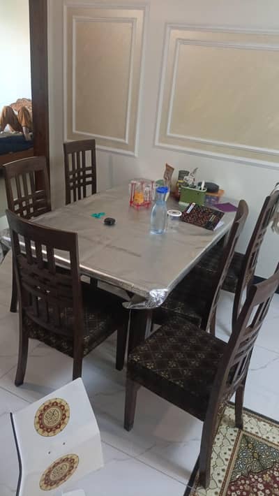 a dining table with chairs
