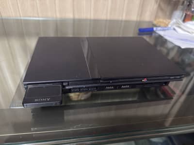 New like PLAYSTATION PS2 (jail breaked)+ Original Games