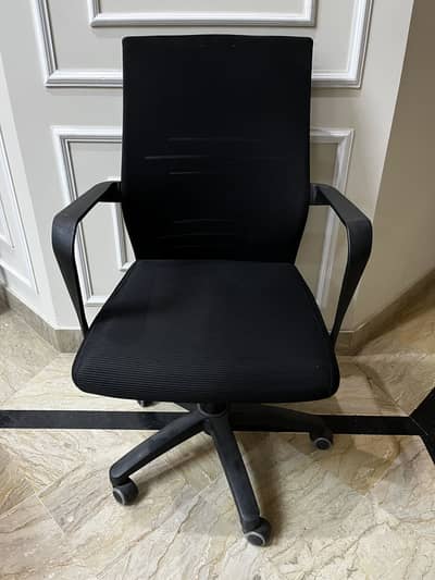 Revolving low back chair
