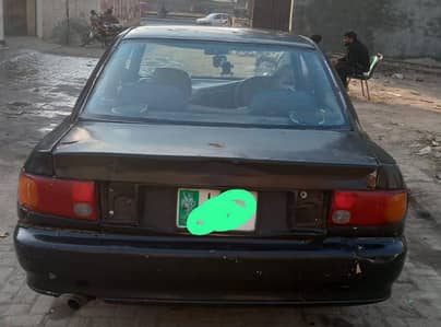 Mitsubishi lancer 1995 price final orignal docs biometric on spot