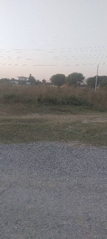 SERVICE ROAD CORNER PLOT