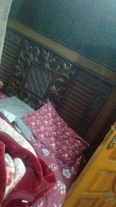 Bed with side tables