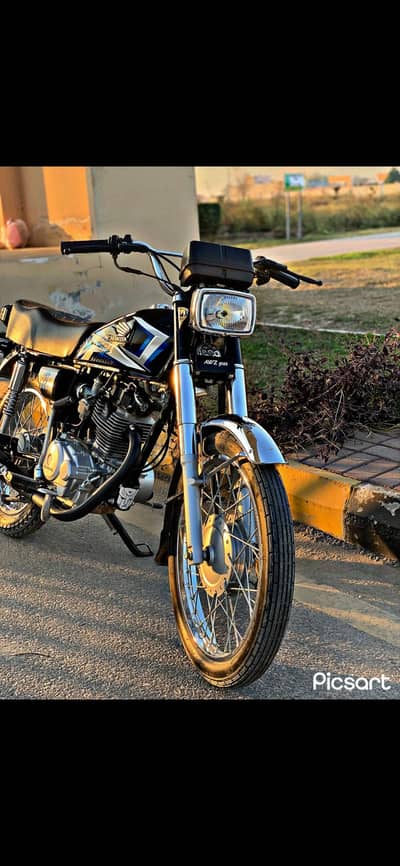 honda 125 double saman k sath