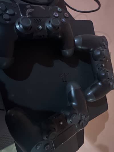 PS4 with 3 controllers