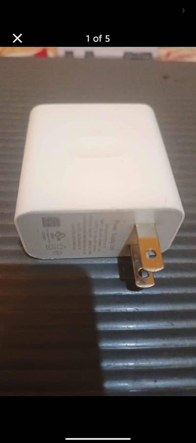 OnePlus Warp Charge 30 Power Adapter (model WCD0506A52JH).