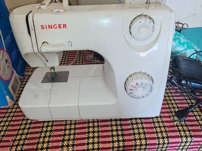 singer 8280 sewing and embroidery machine very less used all ok.