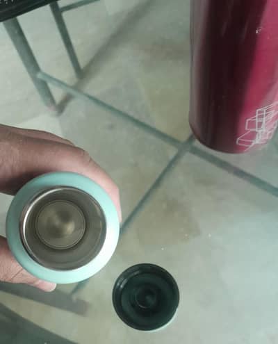 Light blue coffee mug with lid/cap