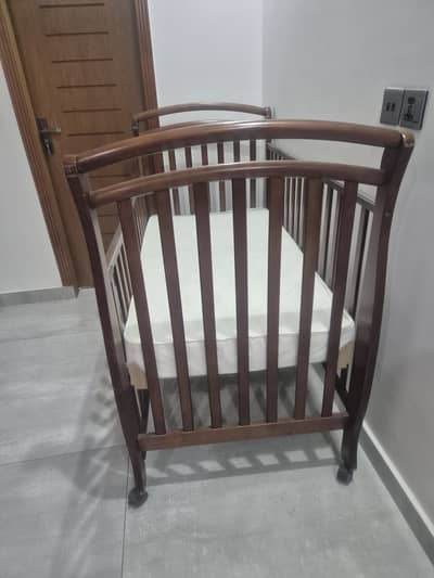 Juniors baby wooden cot